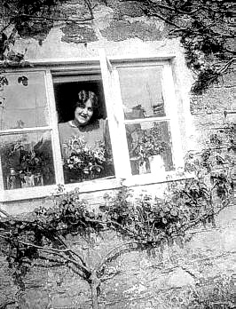 Winifred looking out of a window c1931